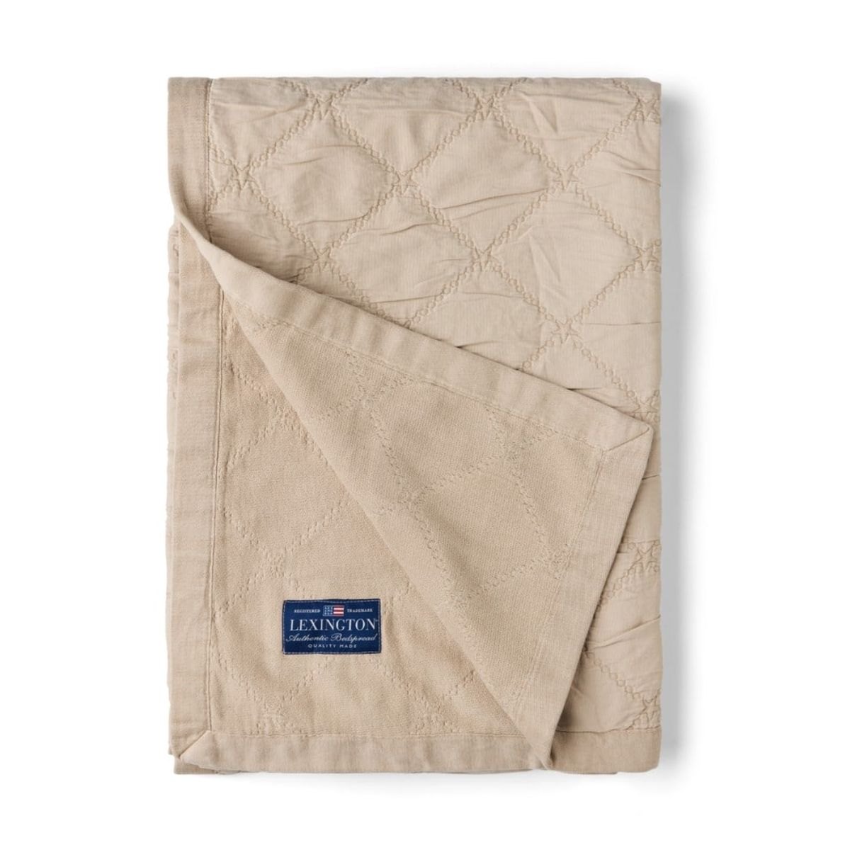 Produktbilde av Lexington Signature Star quiltet sengeteppe - Beige